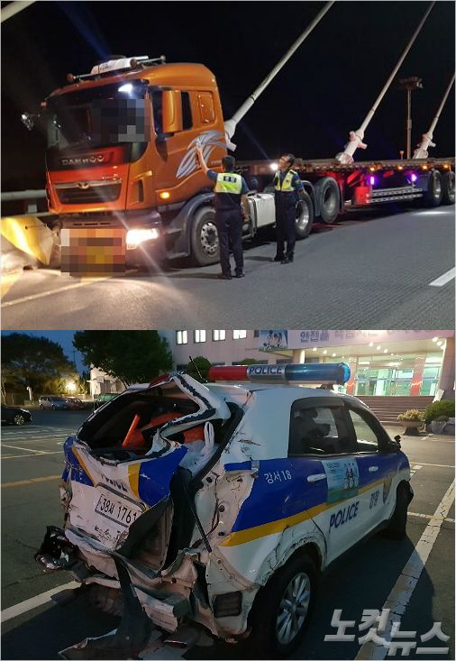 경남 거제와 부산을 잇는 거가대교에서 만취 상태로 25t 트레일러를 몰며 난동을 부린 50대 운전기사가 구속됐다.난동 부린 트레일러(사진1)와 망가진 순찰차(사진2) <사진=부산 경찰청 제공>