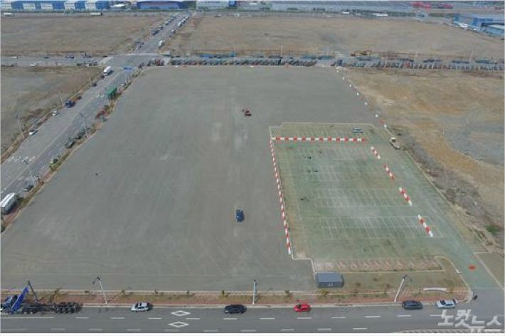 부산항만공사가 경남 진해구 부산항 신항 웅동 배후단지에 마련한 무료주차장(사진=부산항만공사 제공)