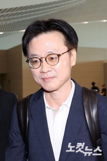 김정관、첫 방미길