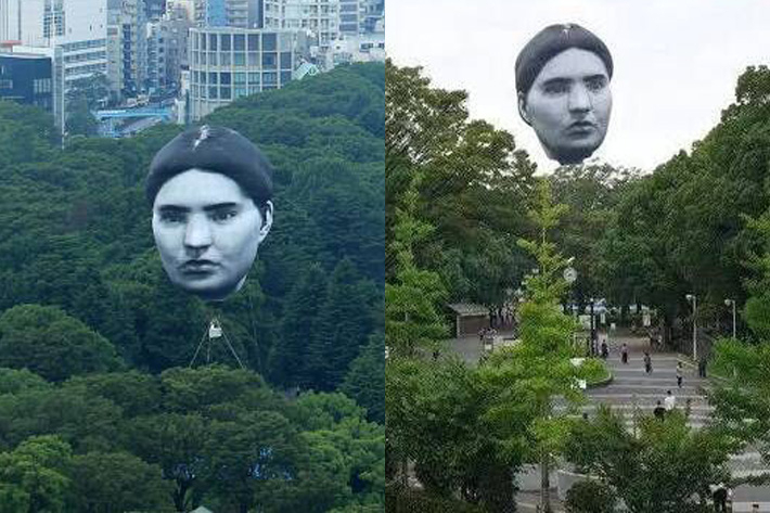 지난 16일 일본 도쿄 시부야 요요기 공원에서 공공 미술 열기구 '마사유메'(正夢)가 떠오르고 있다. 온라인 커뮤니티 캡처 