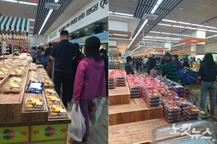 비교적 비싸고 고급스러운 베이징시 또 다른 슈퍼마켓. 이 매장에서도 계산대를 향해 선 줄이 온 매장을 감싸고 있다. 안성용 기자