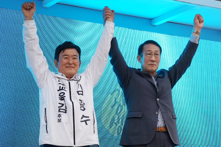김광수 후보와 고창근 전 예비후보(사진 오른쪽). 후보 측 제공