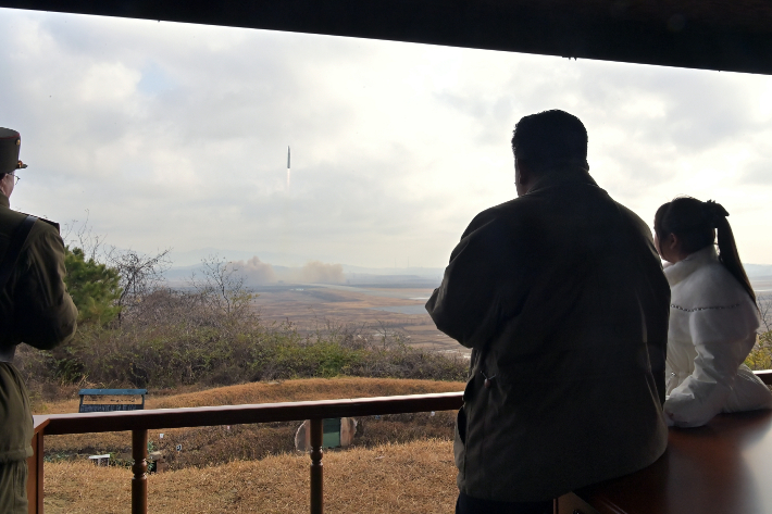 North Korean leader Kim Jong-un observes the Hwasong-17 test launch.  random news