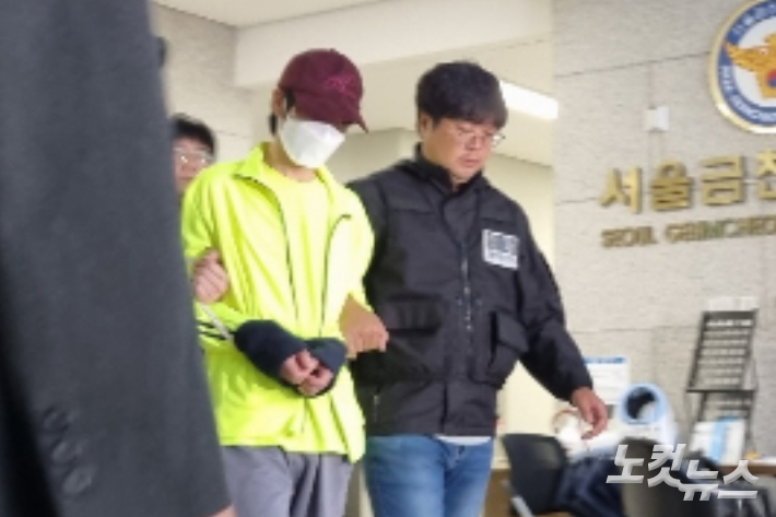 28일 오후 2시, 서울 금천구 시흥동에서 연인을 보복 살해한 혐의를 받는 김모씨가 경찰서를 나서고 있다. 양형욱 기자