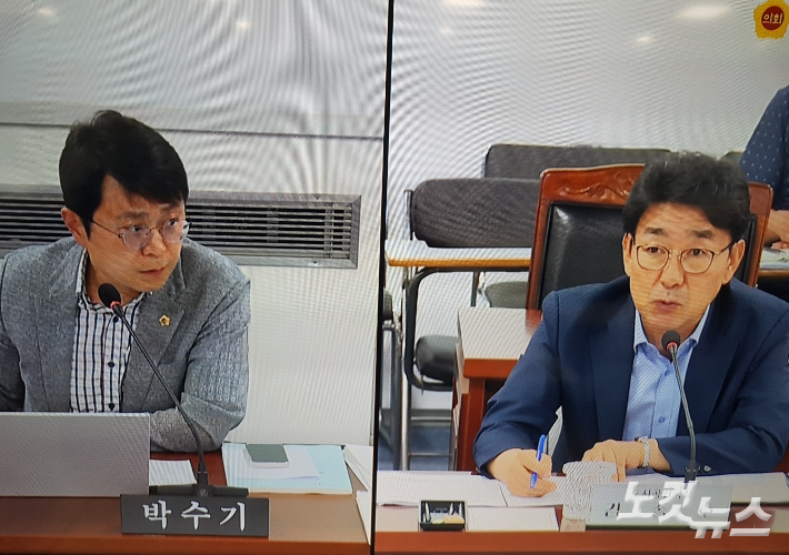 13일 열린 광주광역시의회 산업건설위원회 2차회의에서 박수기 의원(왼쪽)과 김종호 광주시 도시공간국장(오른쪽)이 설전을 벌이고 있다. 김삼헌 기자 