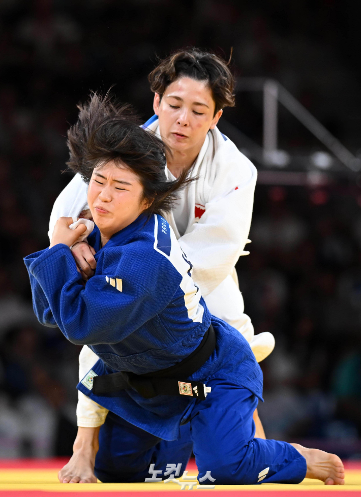 Mimi Huo, que competiu na categoria judô feminino até 57kg nas Olimpíadas de Paris 2024, disputará a final contra a canadense Christa Deguchi, que acontecerá na Arena Champs de Mars, em Paris, França, no dia 29 (horário local).  Paris = co-repórter/correspondente de Fotos Olímpicas Hwang Jin-hwan