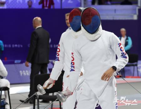 전웅태-서창완, 두 개의 태극 마스크