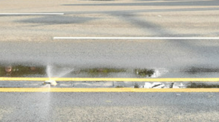 부산 해운대해수욕장 앞 도로에 설치된 쿨링·클린로드 시스템. 해운대구 제공 