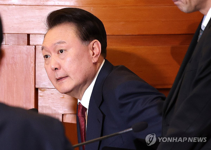 (서울=연합뉴스) 윤석열 대통령이 23일 서울 종로구 헌법재판소에서 열린 탄핵심판 4차 변론에 출석해 있다. 2025.1.23 [사진공동취재단] photo@yna.co.kr 연합뉴스