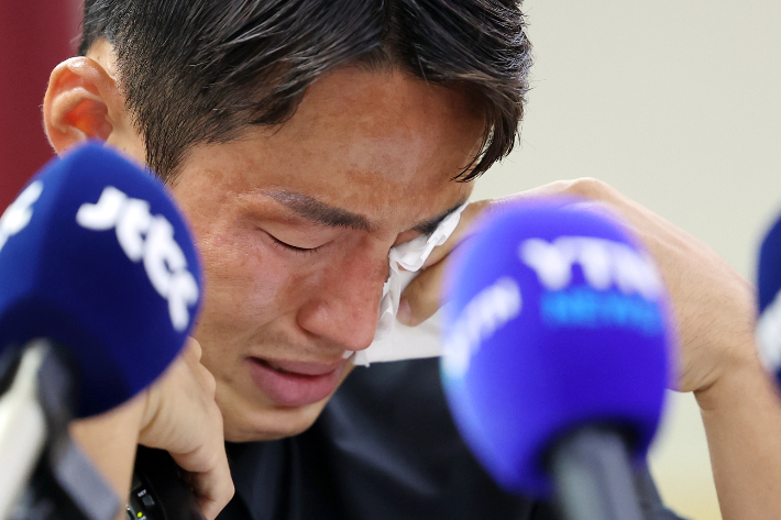 기자회견하는 손준호. 연합뉴스