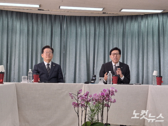 지난 6일 부산을 방문한 이재명 더불어민주당 대표와 박형준 부산시장. 강민정 기자
