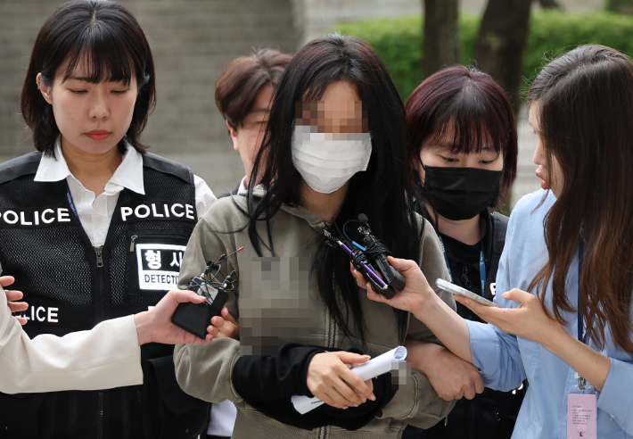 '손흥민 협박' 남녀 검찰에 구속 송치…체포 8일 만