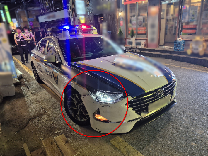 도주한 음주 차량에 부딪힌 경찰차. 부산경찰청 제공
