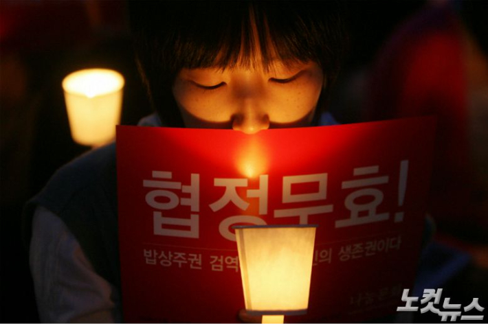 美 소고기 압박하면 '광우병 시위' 사진 보여줬다…협상 막전막후