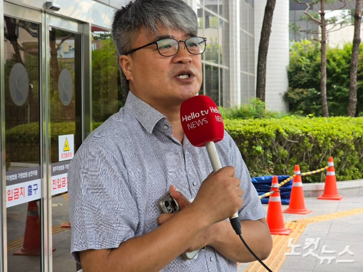 김석 사무총장이 선고 직후 입장을 밝히고 있다. 고영호 기자