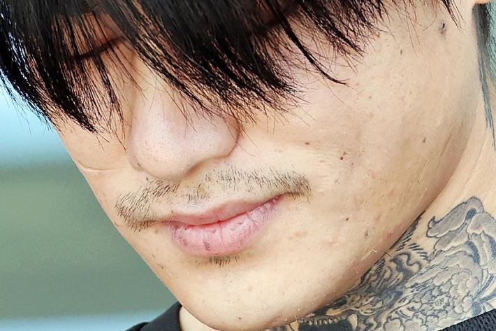 지난해 10월 4일 전남 순천경찰서에서 검찰로 송치되는 박대성의 당시 모습. 연합뉴스