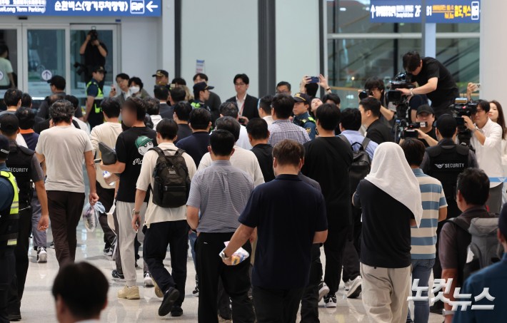 美구금 8일 만에 근로자 귀국