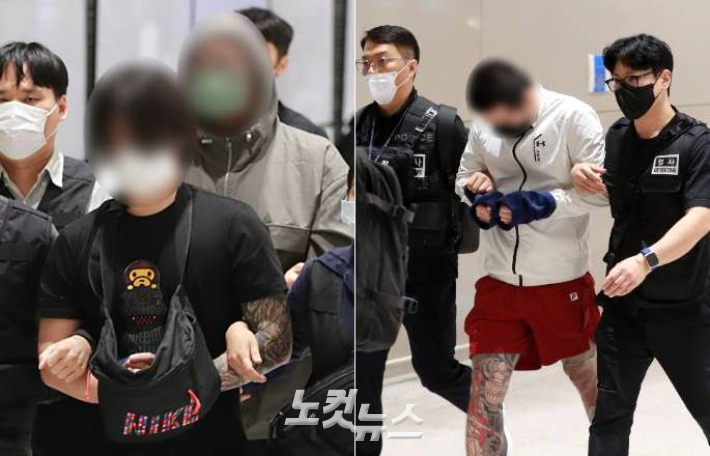 캄보디아에 구금돼 있던 한국인 64명이 18일 오전 인천공항을 통해 송환되고 있다. 이들은 보이스피싱 등 국제 범죄 조직에 가담한 혐의를 받고 있다. 인천공항=황진환 기자