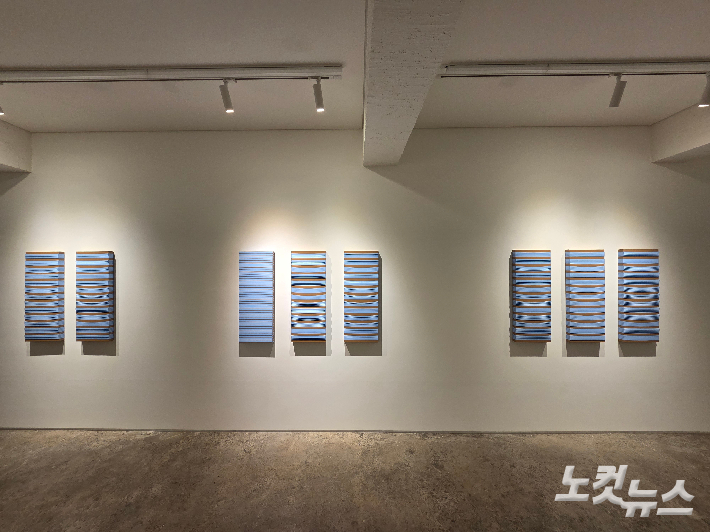 홍미희, 'Highland' 연작, acrylic, paste board, canvas on panel, 30 x 80cm(2025). 곽인숙 기자