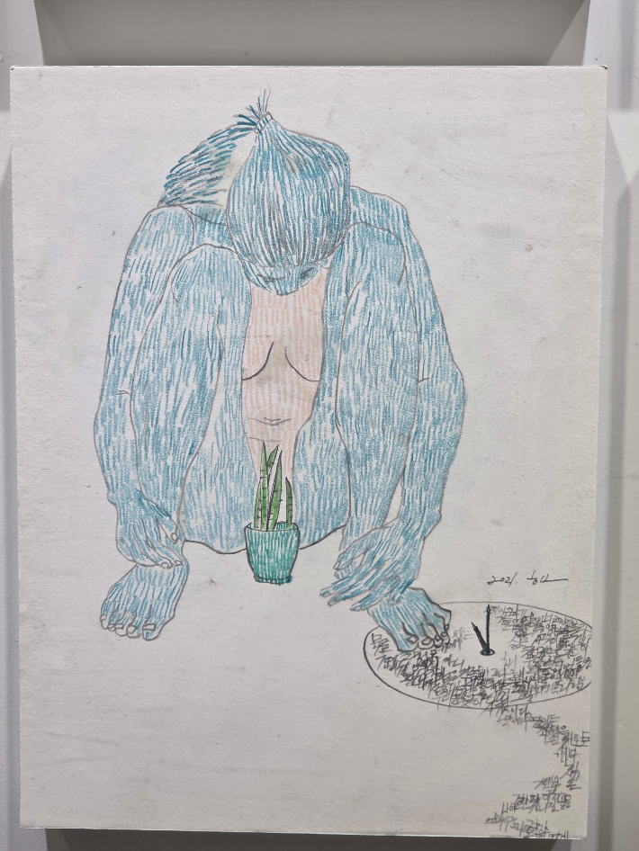 아이들을 화초 키우듯 키우려는 의미로 그렸다는 작가가 그린 자화상. 곽인숙 기자 