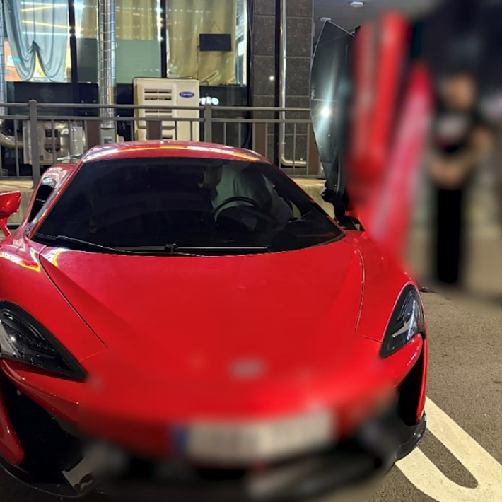 투자리딩방 사기조직 사무실에서 압수한 외제차량. 경기남부경찰청 제공