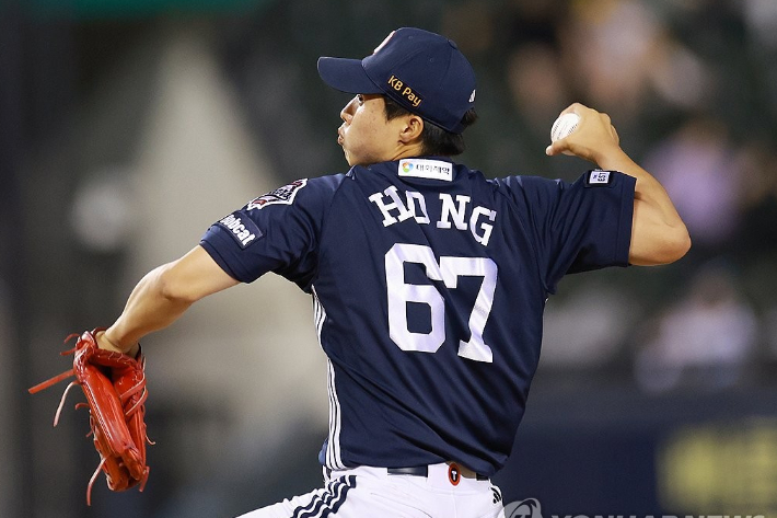 FA로 KIA에서 이적한 내야수 박찬호의 보상 선수로 팀을 옮기는 두산 신인 우완 홍민규. 연합뉴스