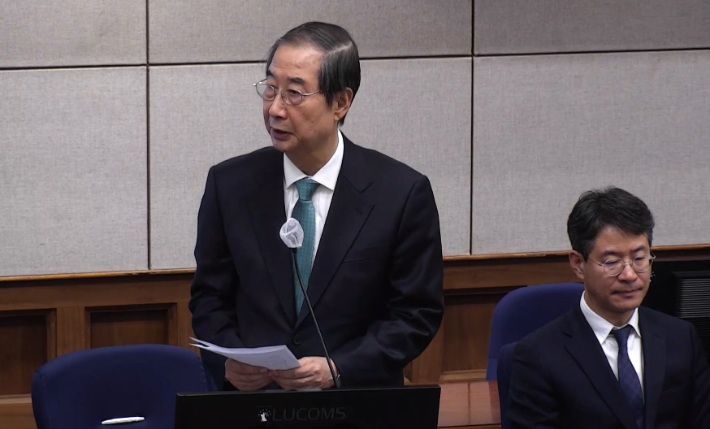 한덕수 전 국무총리가 26일 서울 서초구 서울중앙지법에서 열린 내란 우두머리 방조, 내란 중요임무 종사 및 위증 등 혐의 결심공판에서 최후진술을 하고 있다. 연합뉴스