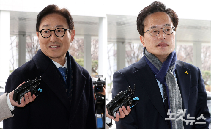 국회 '패스트트랙 충돌' 사건에 연루된 더불어민주당 박범계, 박주민 의원이 19일 서울 양천구 서울남부지법에서 열린 1심 선고공판에 출석하고 있다. 황진환 기자