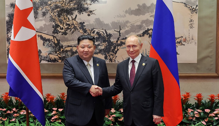 9월 3일 베이징 댜오위타이 국빈관에서 만난 김정은 북한 국무위원장과 블라디미르 푸틴 러시아 대통령. 연합뉴스