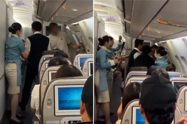 대한항공 항공기에서 난동을 부리는 외국인 승객이 제압당하는 모습. X(옛 트위터) 갈무리