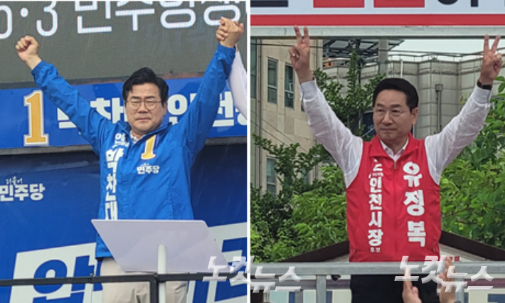 27일 강화군 풍물시장에서 선거유세에 나선 더불어민주당 박찬대 인천시장 후보와 국민의힘 유정복 인천시장 후보. 박창주 기자