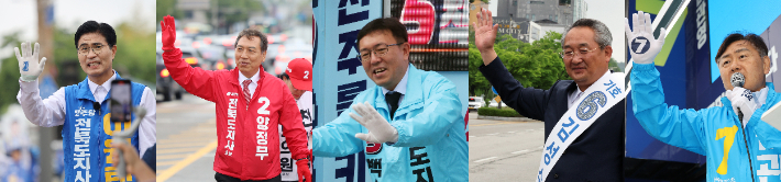 6·3 지방선거 공식선거운동 첫날이었던 21일 오전 전북특별자치도지사 후보들이 지지를 호소하고 있다. 왼쪽부터 더불어민주당 이원택·국민의힘 양정무·진보당 백승재·무소속 김성수·무소속 김관영 후보(기호순). 연합뉴스
