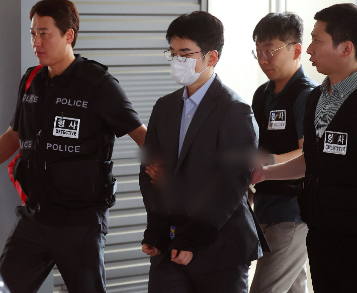 '음료 테러 자작극' 정이한 구속 송치…"성실히 수사·재판 받겠다"