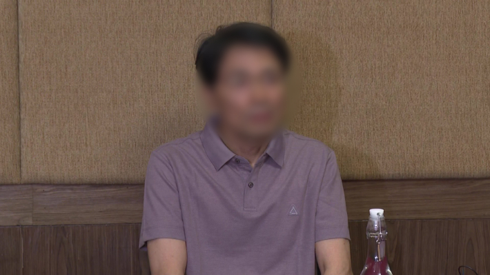 취재진과 인터뷰하는 두산에너빌리티 현장소장. 연합뉴스
