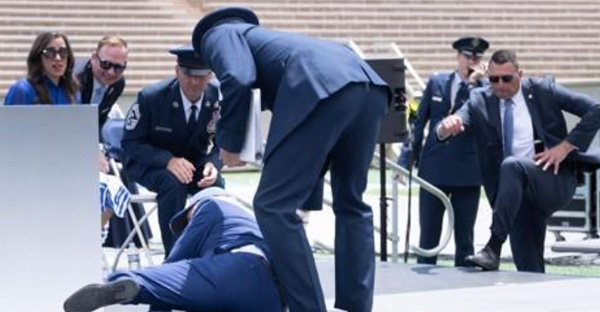 President Joe Biden trips and falls at US Air Force Academy graduation ceremony